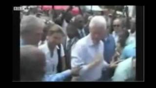 Bush Wipes Hand On Clinton After Haiti Handshake Video [upl. by Croner]