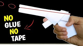 How to Make Paper Gun without Glue and Tape  Paper Gun that shoots [upl. by Eladnek189]