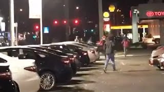 Trump Protesters Smash Windows of Cars Businesses [upl. by Tterraj440]