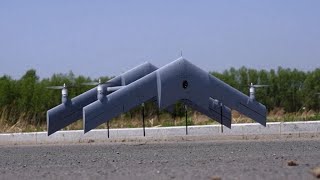 Fixedwing drone capable of vertical takeoff unveiled at China HighTech Fair [upl. by Kcirdle]