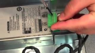 Installing a DC Power Supply Module in an Agilent N6705B DC Power Analyzer [upl. by Airdnazxela]