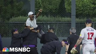 Fans tackle Braves outfielder Ronald Acuña Jr during game [upl. by Anivlac]