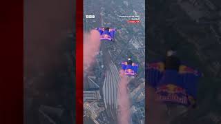 Skydivers complete wingsuit flight through Londons Tower Bridge in world first Skydiving BBCNews [upl. by Dallis]