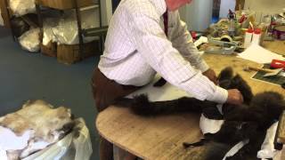 Hand finishing Glencroft sheepskin rugs [upl. by Laenaj]