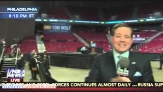 Half of the arena covered by black curtain to hide the empty seats at Obama appearance in Philly [upl. by Fulvia114]