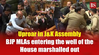 Uproar in JampK Assembly BJP MLAs entering the well of the House marshalled out [upl. by Aneel724]