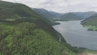 Vågå Vågåmo Vågåvatnet Frisvoll Lom Stavkirke  Flying Over Norway [upl. by Consuelo]