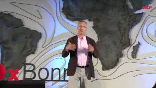 The role of remittances in a broader development context  Leon Isaacs  TEDxBonn [upl. by Reifinnej]