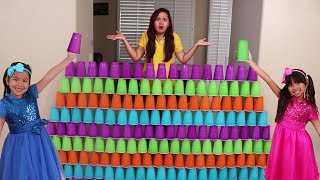 Emma amp Jannie Pretend Play Fun Stacking Giant Cup Wall Challenge Kids Toys [upl. by Darnok]