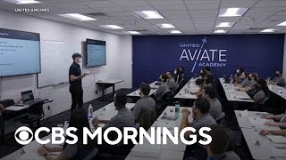 United Airlines launches a pilot academy to address staffing shortage [upl. by Ahsimot425]