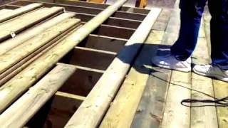 STRAIGHTEN PRESSURE TREATED DECKING BOARDS 2 [upl. by Selrahcnhoj694]