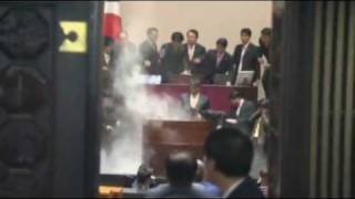 MP launches tear gas attack in South Korea parliament over US trade deal [upl. by Zsa Zsa]