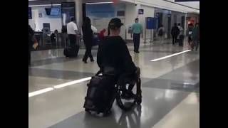 Aaron Baker using the Permobil Smart Drive with Wheelchair Luggage [upl. by Elnukeda]