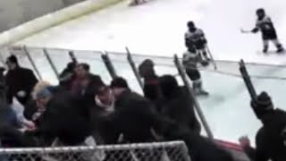 PARENTS BRAWL Police in investigating after parents caught on video fighting at youth hockey game [upl. by Leroi933]