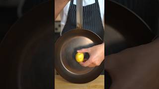 Seasoning a carbon steel pan with a potato kitchenhacks cooking [upl. by Sueaddaht]