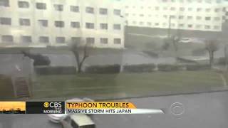 Japan typhoon sends car flying [upl. by Adlog]