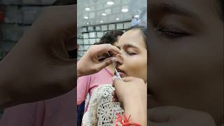 Nose piercing process with needlesilver jewellery trending youtubeshorts shorts [upl. by Bocyaj578]