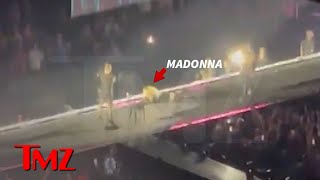 Madonna Falls Off Chair Onstage During Seattle Concert  TMZ [upl. by Heyman]