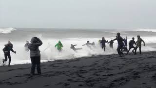 Waves Sneak Up Reynisfjara Beach in Iceland and Knock Over Tourists [upl. by Geer51]