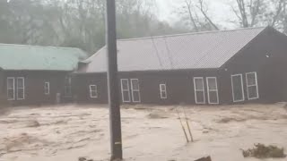 North Carolina homes float away collide in Helene flood waters [upl. by Amhser338]