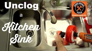 How to Unclog a Kitchen Sink Drain  by Home Repair Tutor [upl. by Lienaj]