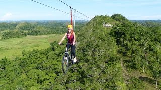 Tourists Ride Bicycle Over Zipline [upl. by Nawed]