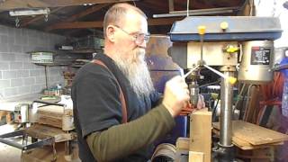 making holes for stitching the leather knife sheath [upl. by Ylrebmek]