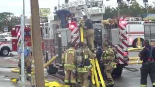 Firemen Putting Hose On Fire Truck [upl. by Aneekan]