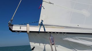 Captain Daggett Sailing Tips  Setting the reefing line on the boom [upl. by Eilram]