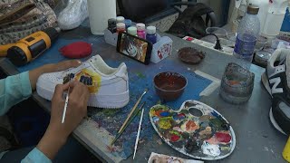 Young Tunisian artists bring new life to old trainers  AFP [upl. by Naltiak]