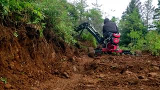 Trail Building With Towable Backhoe [upl. by Hook]