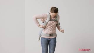 BABYBJÖRN  How to place your child on your back in Baby Carrier One [upl. by Adilem]