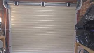 Insulated automatic roller garage door [upl. by Fessuoy]