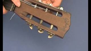 Changing strings on a Nylon String Guitar at the headstock  from guitarforbeginnerscom [upl. by Weiner]