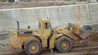 CAT 988B loader moving large rocks [upl. by Bricker]