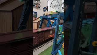 A Diesel freight train passes through a lit Blue Bridge shorts youtube modeltrains [upl. by Samara]