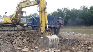 Kobelco SK 150 Loading Triaxles [upl. by Emmons986]