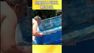 Un papá intenta armar una pileta SALE MAL 😨 humor memes argentina piletas paciencia shorts [upl. by John654]