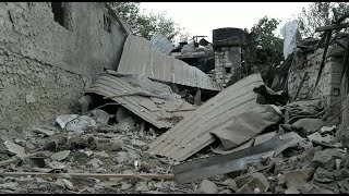 Buildings destroyed by shelling in NagornoKarabakhs main city  AFP [upl. by Travers490]