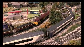 Class 66 66040 DCC with sound and Class 66 66783 DC pulling trains [upl. by Fremont]