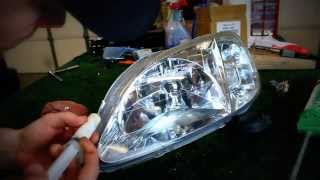 How to repair a headlight with moisturewater in it [upl. by Airetnahs228]