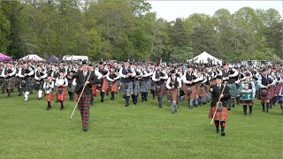 Massed Pipes and Drums march off ending the 2024 Banchory North of Scotland Pipe Band Championship [upl. by Agnola]