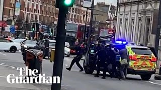 Streatham police arrive on the scene after man shot by armed officers in terror incident [upl. by Cohleen940]