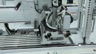 Automatic adhesive tape attaching system [upl. by Mavra]