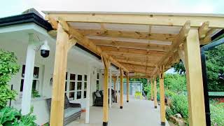 Lshaped pergola total length 15m x 3m with a bronze polycarbonate roof [upl. by Orrocos]