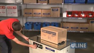 Uline H2079 SemiAutomatic Poly Strapping Machine  Demonstration [upl. by Nowell160]