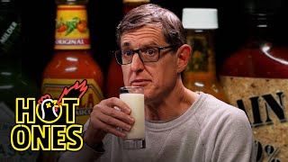 Louis Theroux Attacks the Shark While Eating Spicy Wings  Hot Ones [upl. by Treborsemaj]