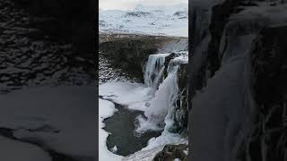 Kirkjufell in Iceland 🇮🇸 iceland waterfall icelandtravel icelandtrip snow winter [upl. by Damales]