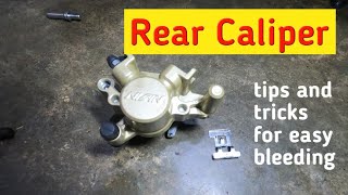 Sniper MX135 rear break caliper replacing new caliper [upl. by Eitsirhc]