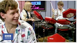 1984 BILL BRUFORD on the SIMMONS ELECTRONIC DRUM KIT  Micro Live  Retro Tech  BBC Archive [upl. by Ilil172]